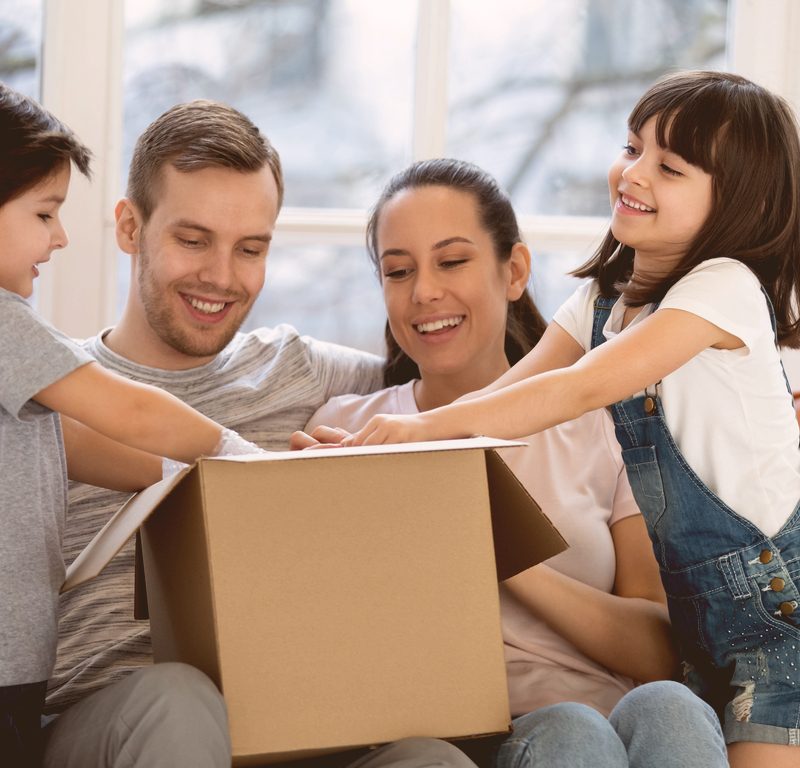 Happy Family Unboxing a Product